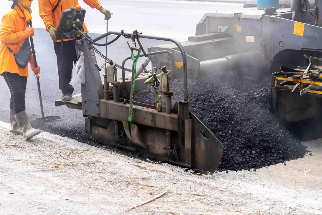 Pouring Asphalt in Driveway